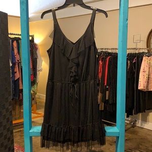 Black dress with mesh overlay